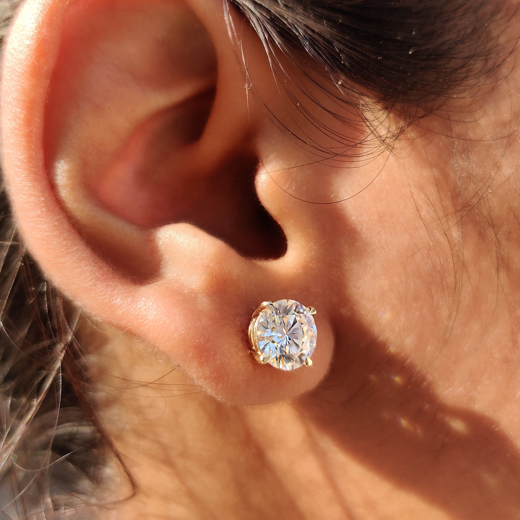 Round cut earrings designed as Moissanite Stud Earrings with handmade jewelry quality.
