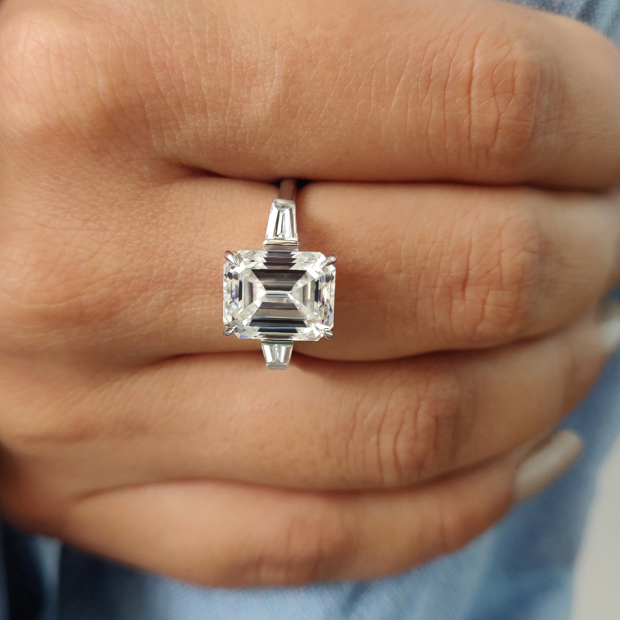 This white gold moissanite ring offers a cool, sleek finish with a brilliant stone.