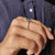 The pave engagement ring features stones set around the band.