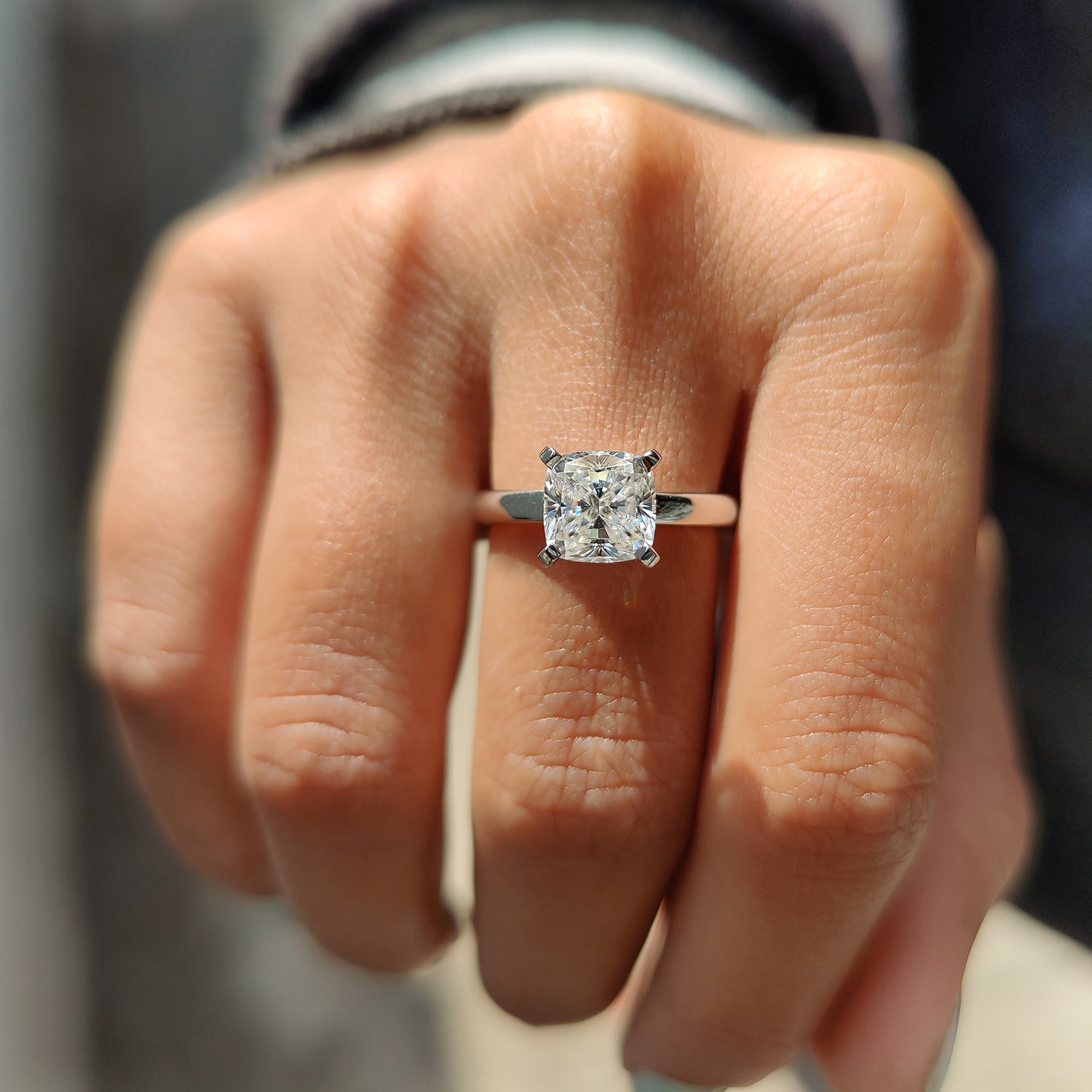 Handmade jewelry with moissanite solitaire design.
