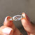This moissanite 3 stone ring symbolizes love across time.
