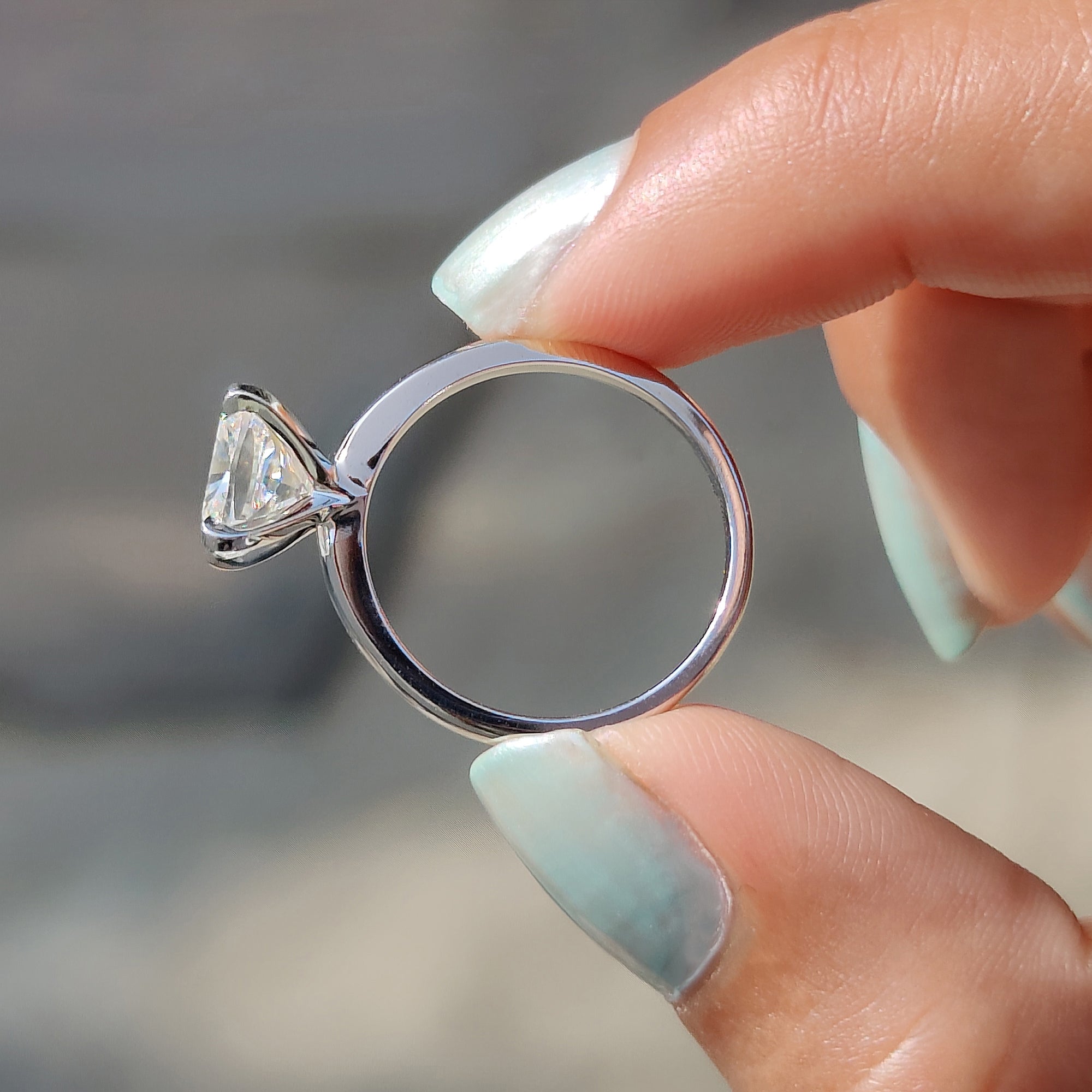 White gold engagement ring with classic design.
