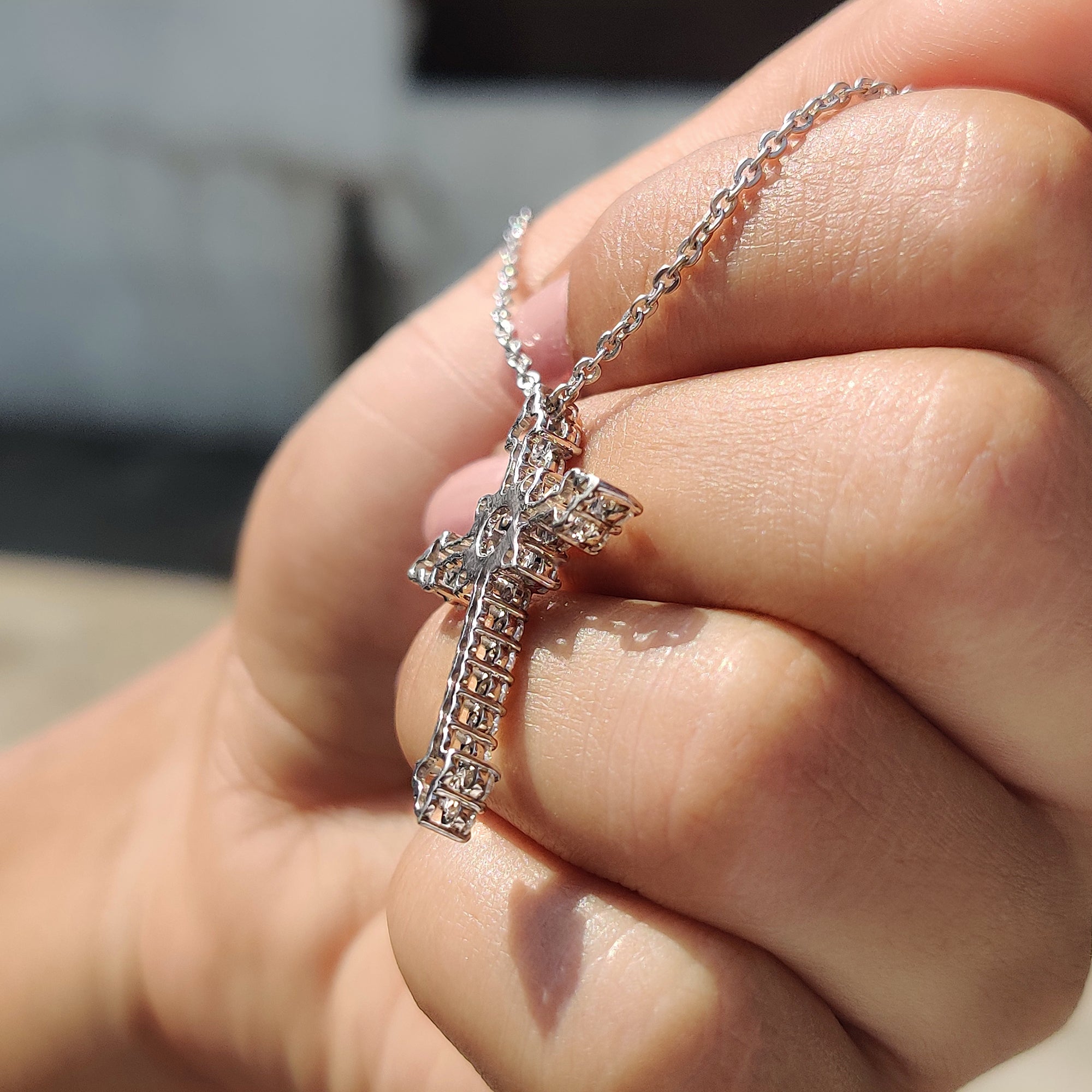 Cross pendant available in white gold pendant with moissanite pendant design.
