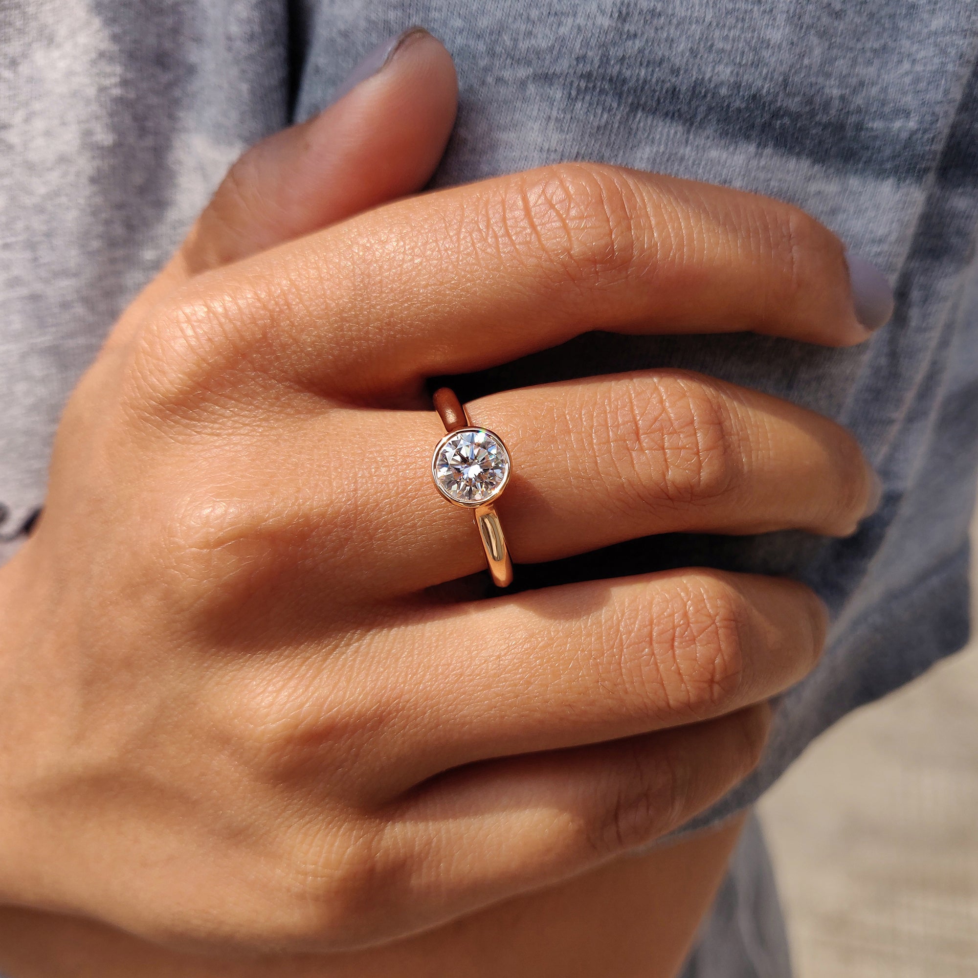 Custom engagement ring with bezel setting.