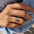A twisted ring setting brings a unique, sophisticated twist to a classic design.

