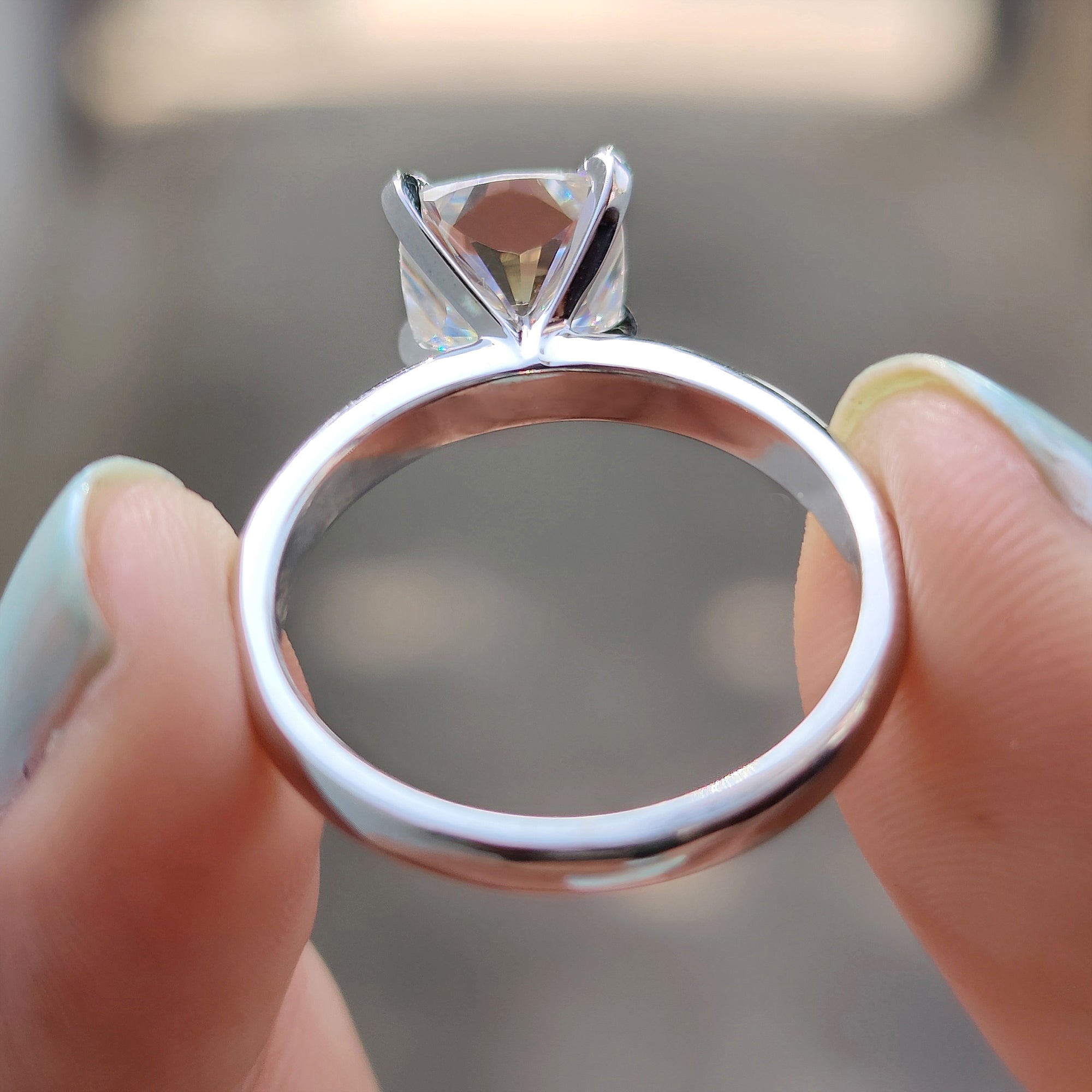 Handmade cushion cut engagement ring.
