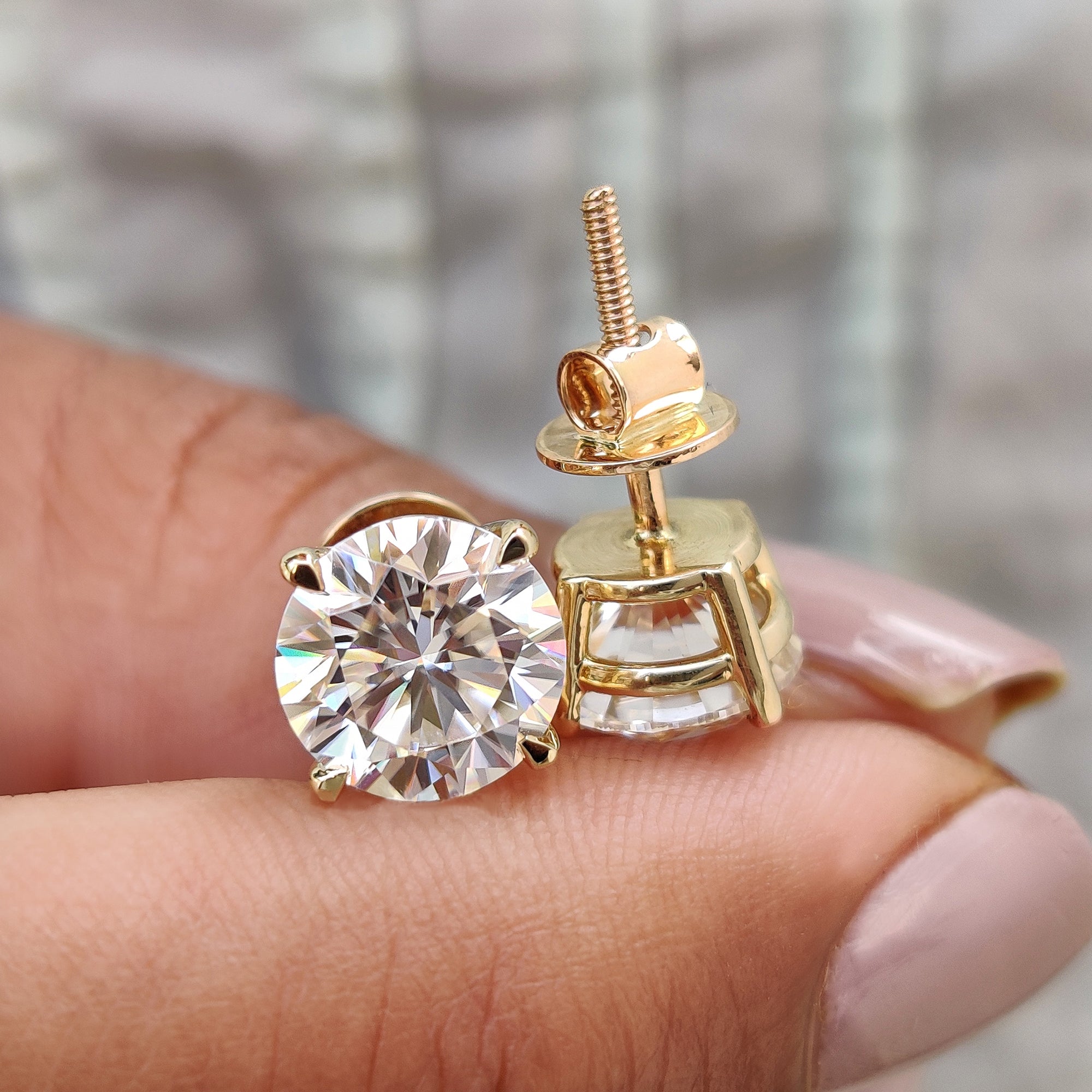 Round cut stud earrings featuring screw back earrings for secure fit and everyday use.
