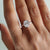An oval bezel ring offers sleek elegance and protection for the stone.
