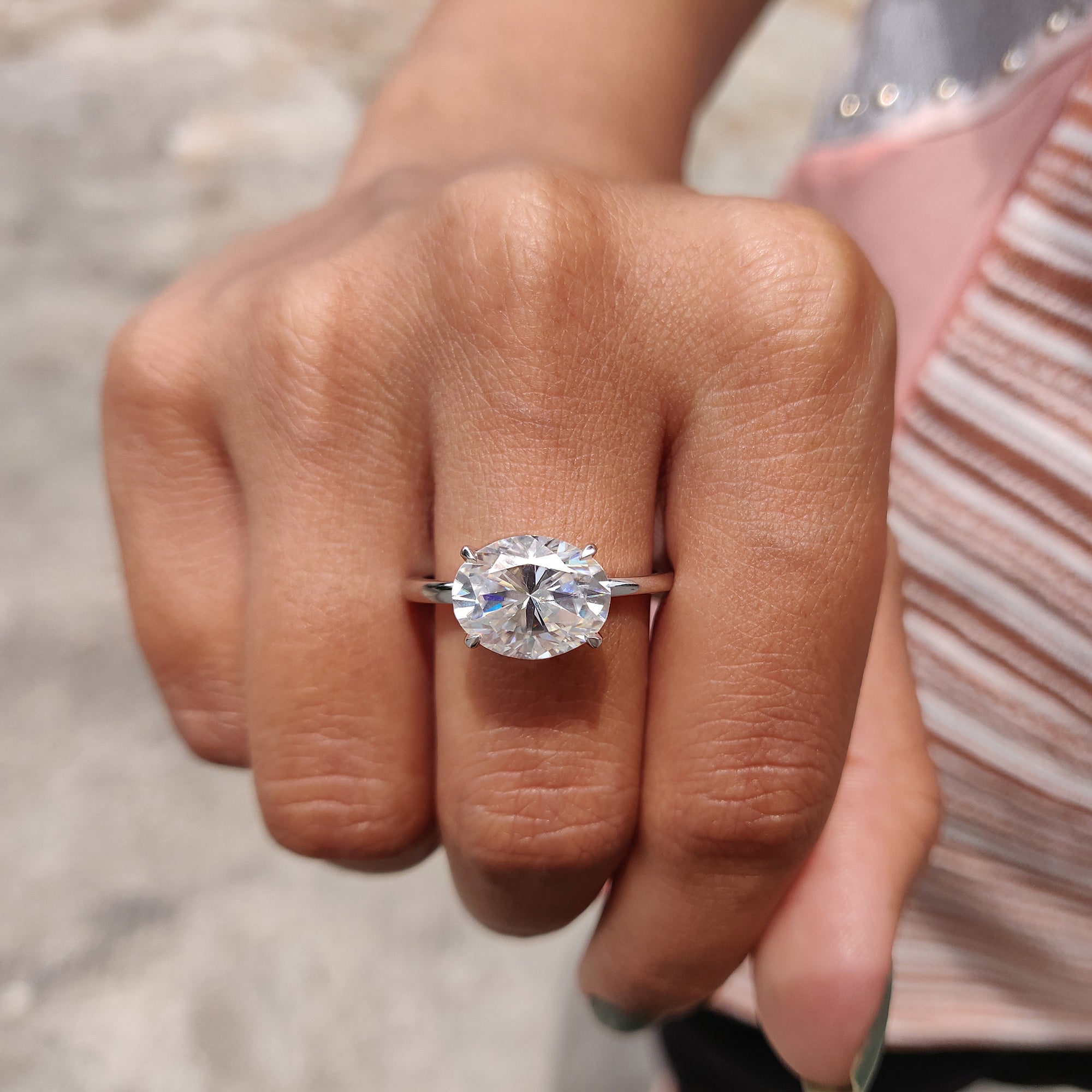 Buy engagement ring with a 4 prong claw setting.