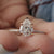 5 prong setting secures the center stone.
