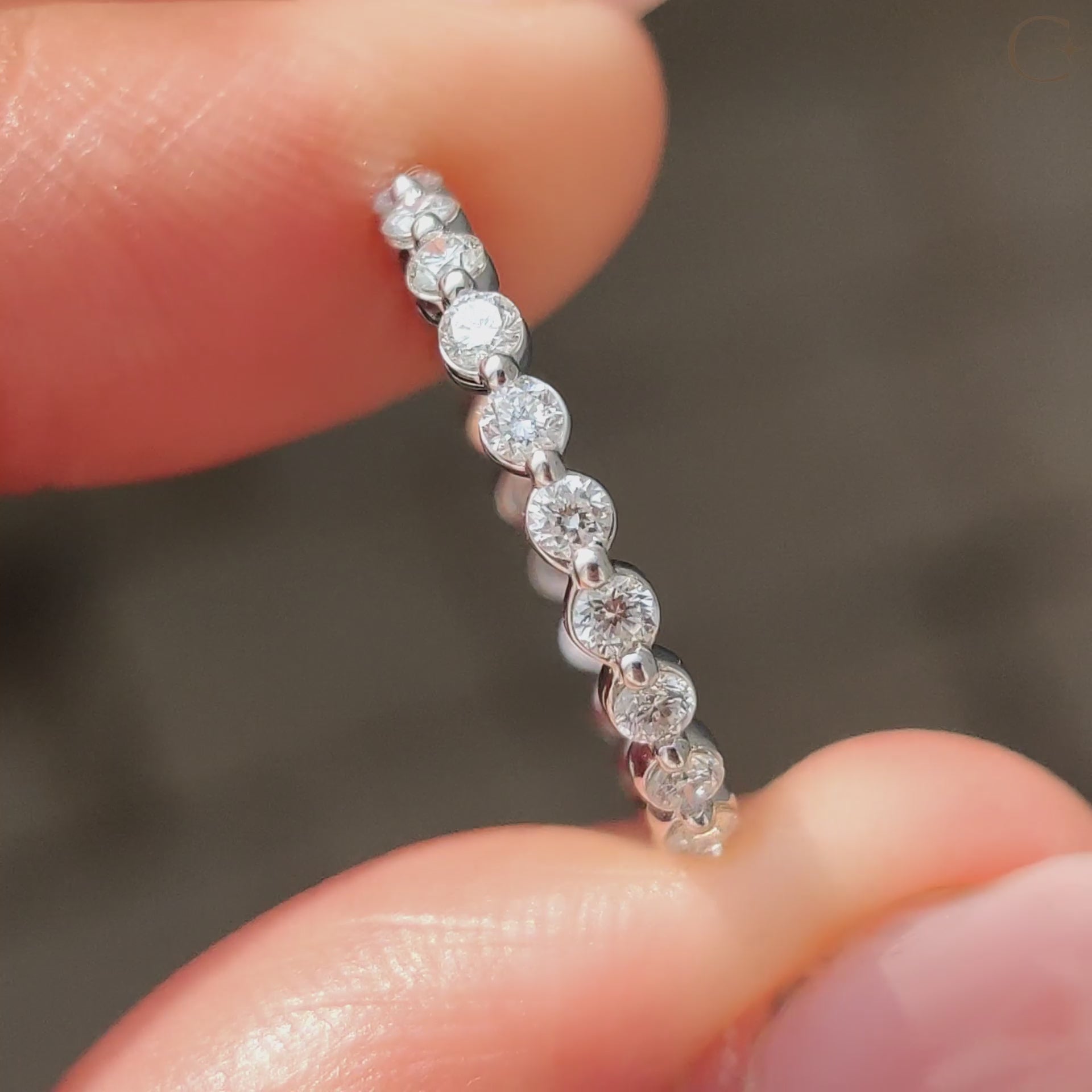 Eternity wedding band with continuous diamond brilliance.
