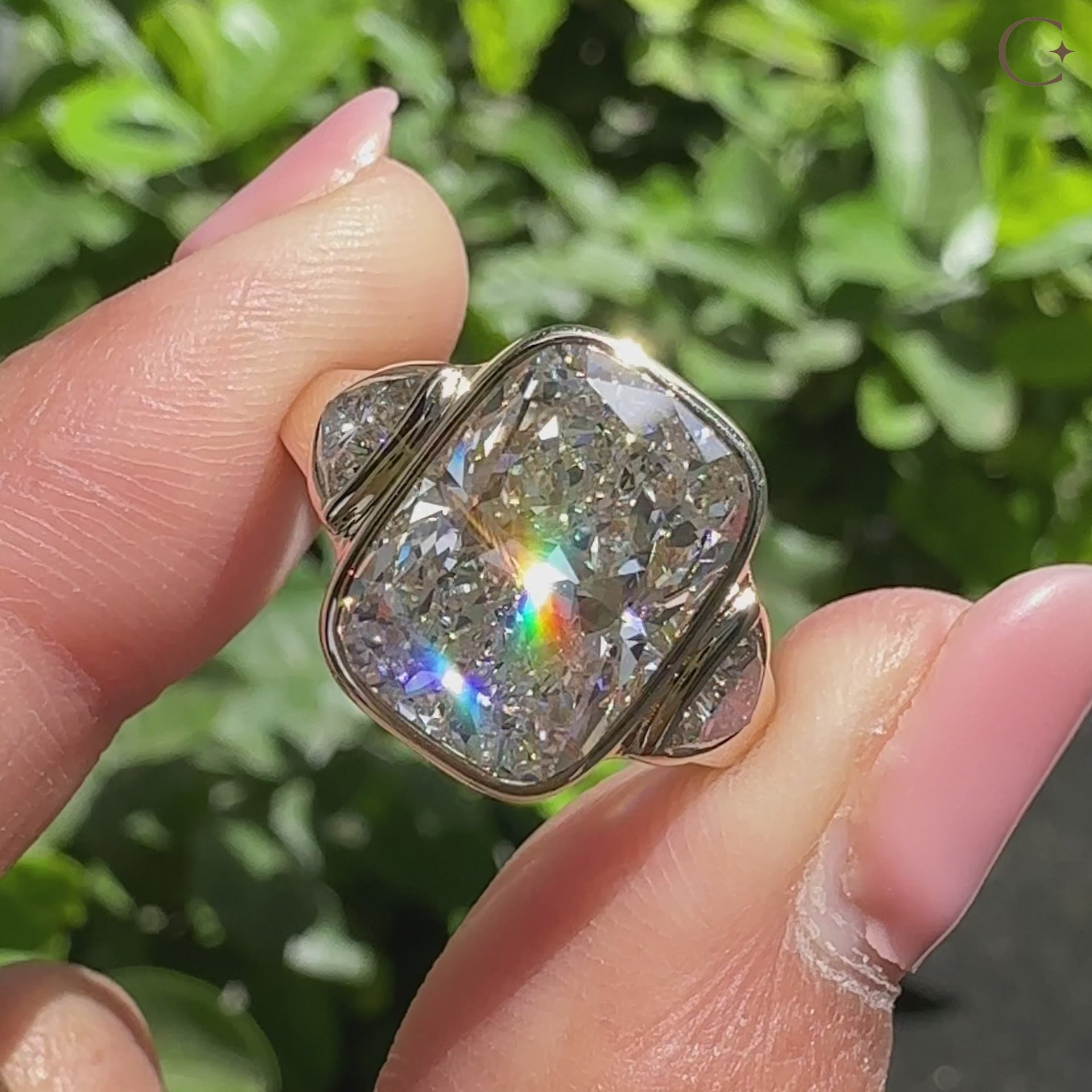 Elongated cushion cut ring with trillion side stones and clean profile