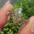 Yellow Dutch Marquise Ring with Green Round Side Stones in Flower Design
