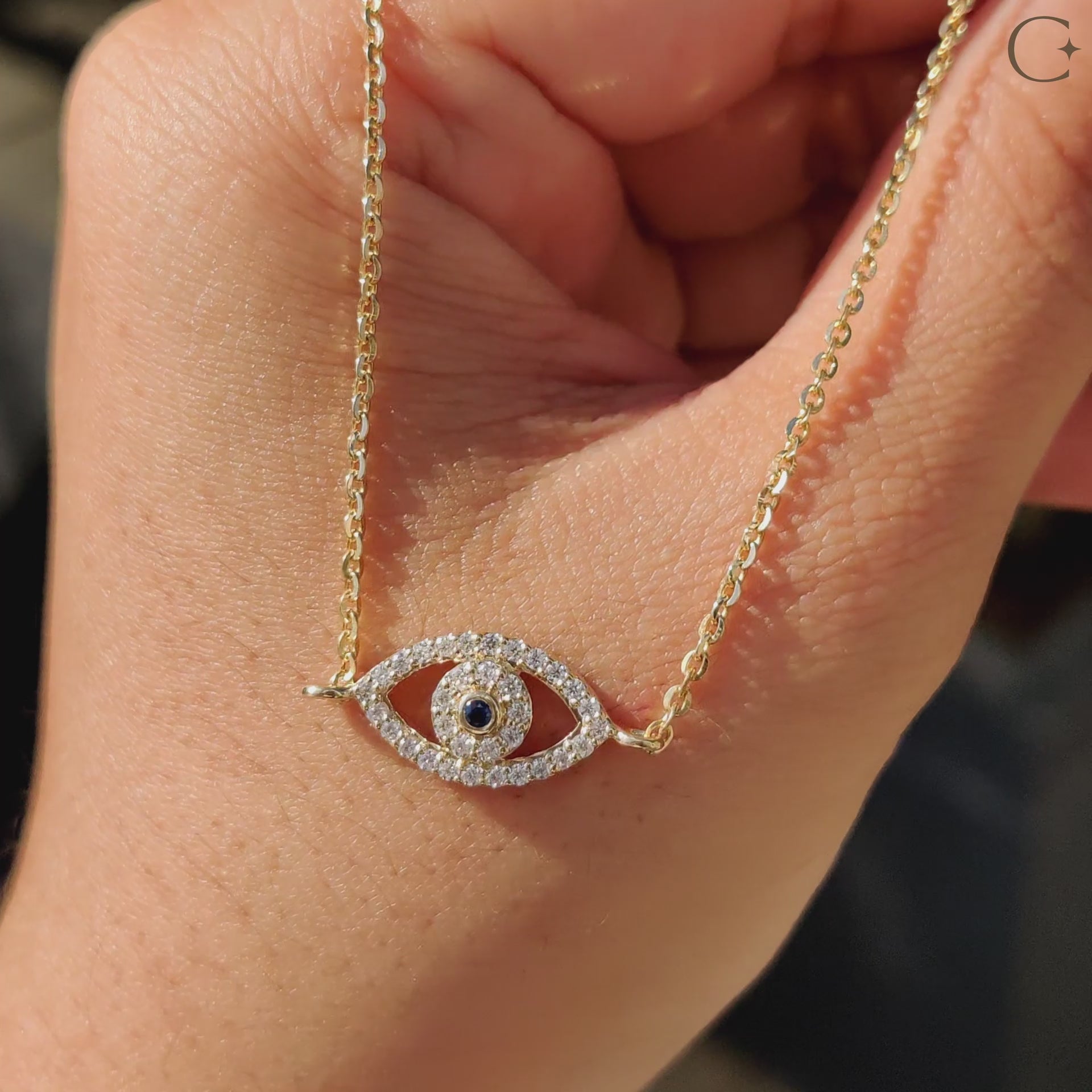 Yellow gold pendant featuring a unique diamond design from Carat Diamonds.