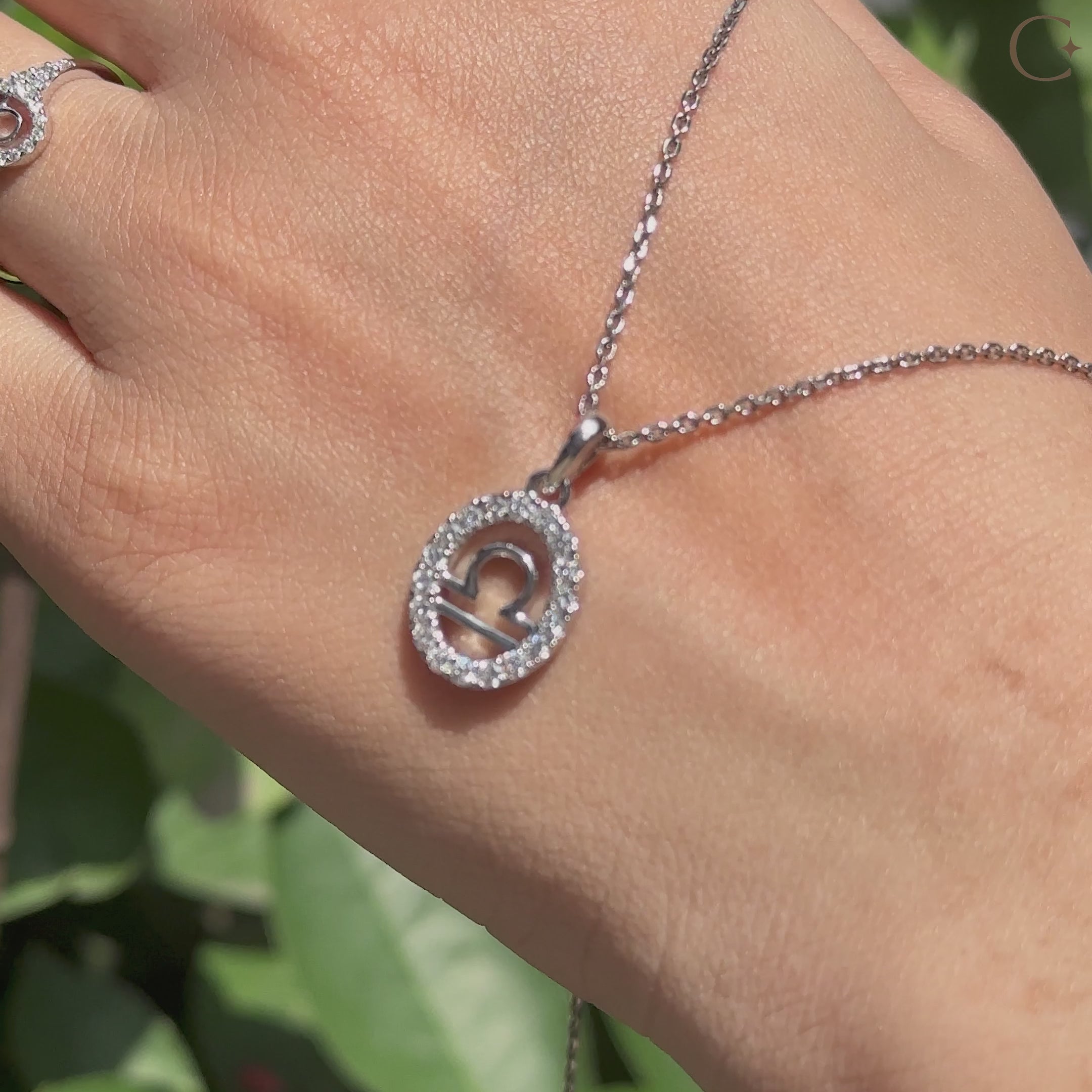 Handmade Libra zodiac pendant with lab-grown diamonds by Carat Diamonds.