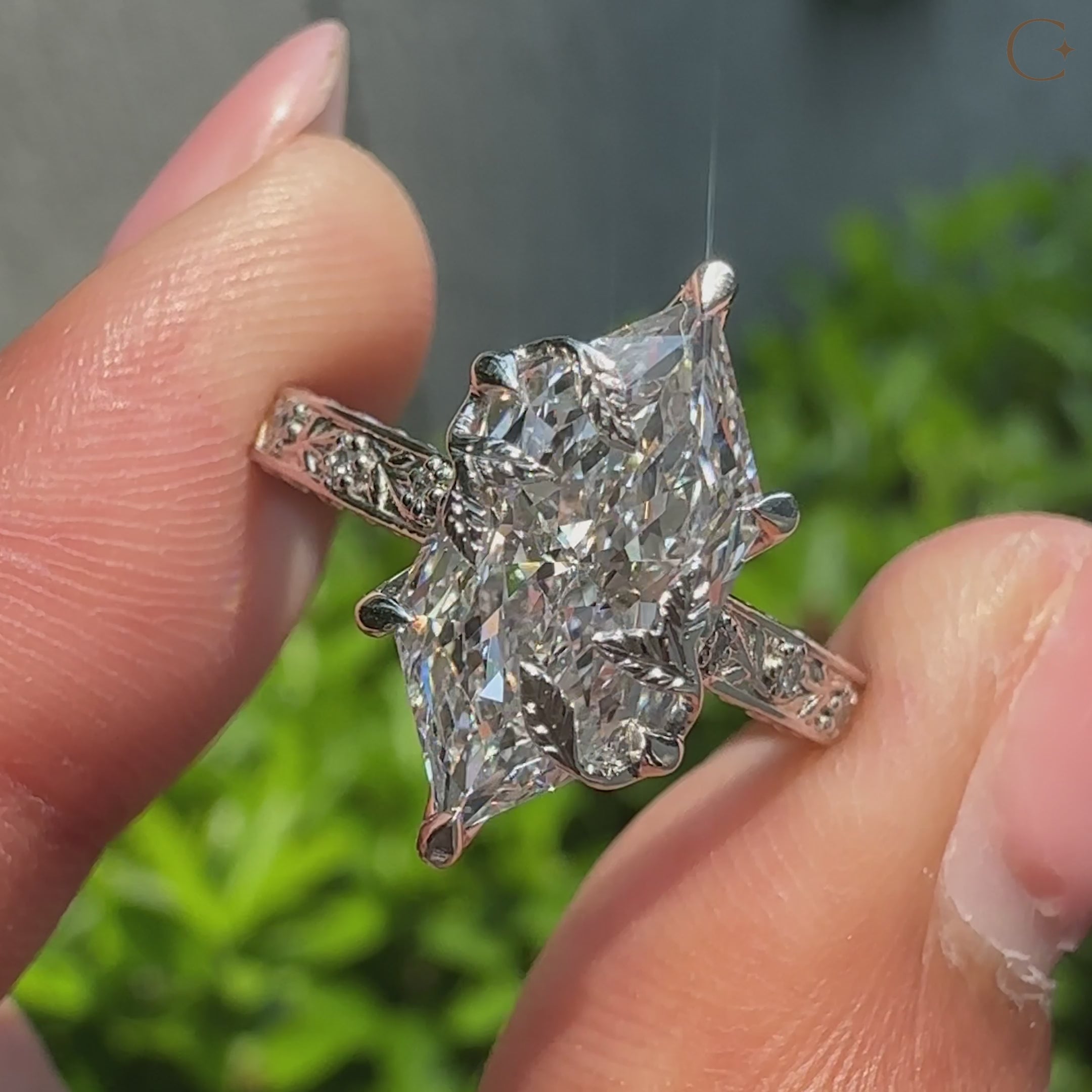 Round diamond accents on a Dutch marquise ring.
