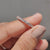 Full eternity wedding band showcasing a continuous row of diamonds.