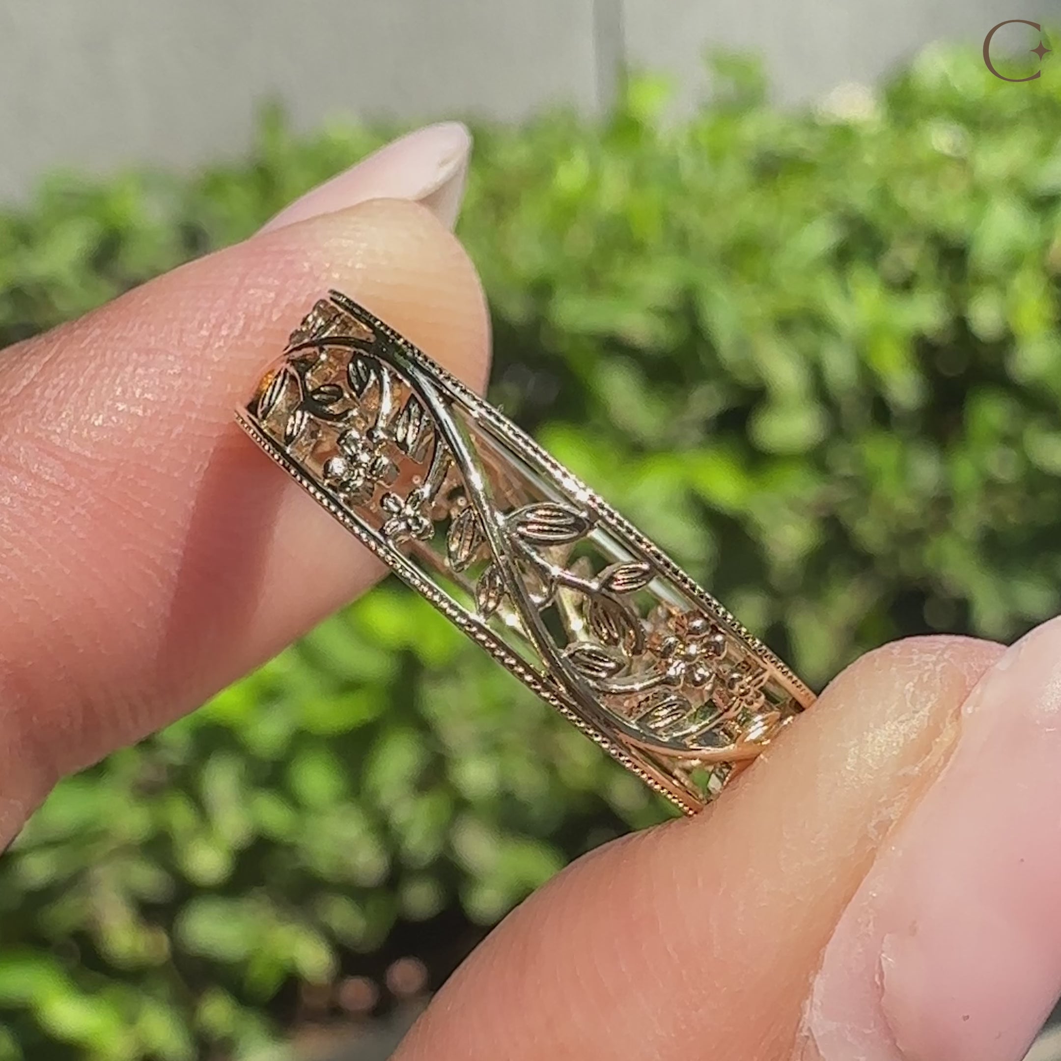 Vintage Victorian flower wedding band with botanical details.
