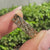 Vintage Victorian flower wedding band with botanical details.
