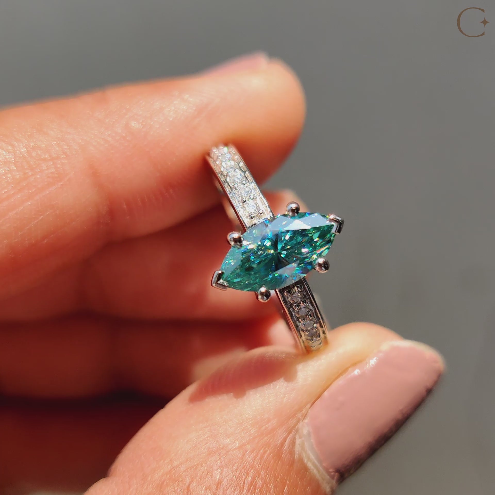 Hidden halo setting on a marquise moissanite ring for added elegance and brilliance.