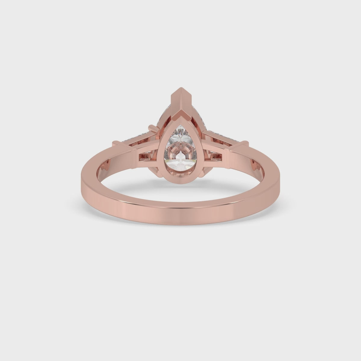 Pear and Baguette Cut Three Stone Engagement Ring