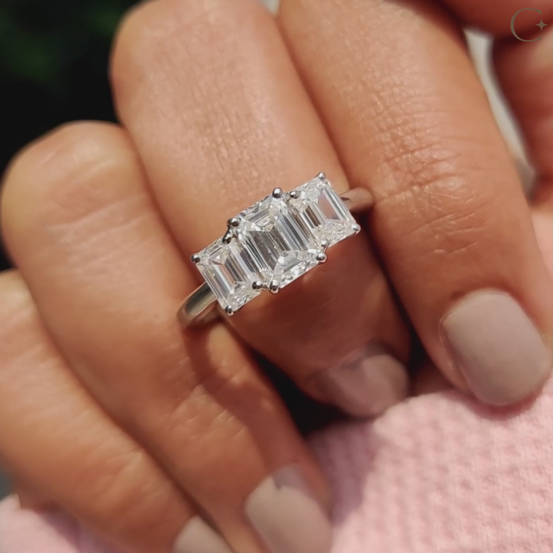 The 3 stone emerald cut ring offers sharp lines and classic elegance.