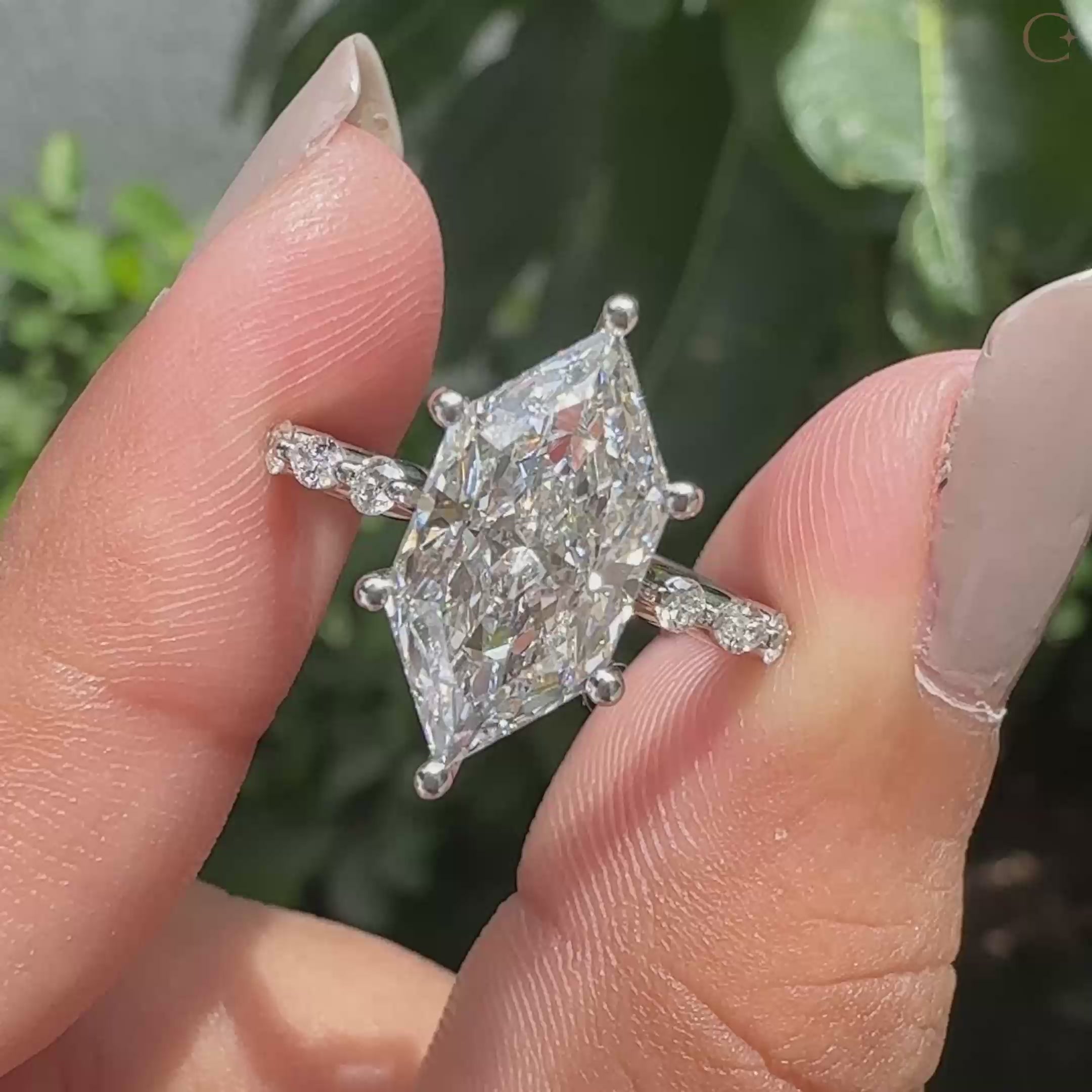 7 stone engagement ring with carat diamonds.
