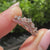 Round diamond tiara band with pink accent diamonds details
