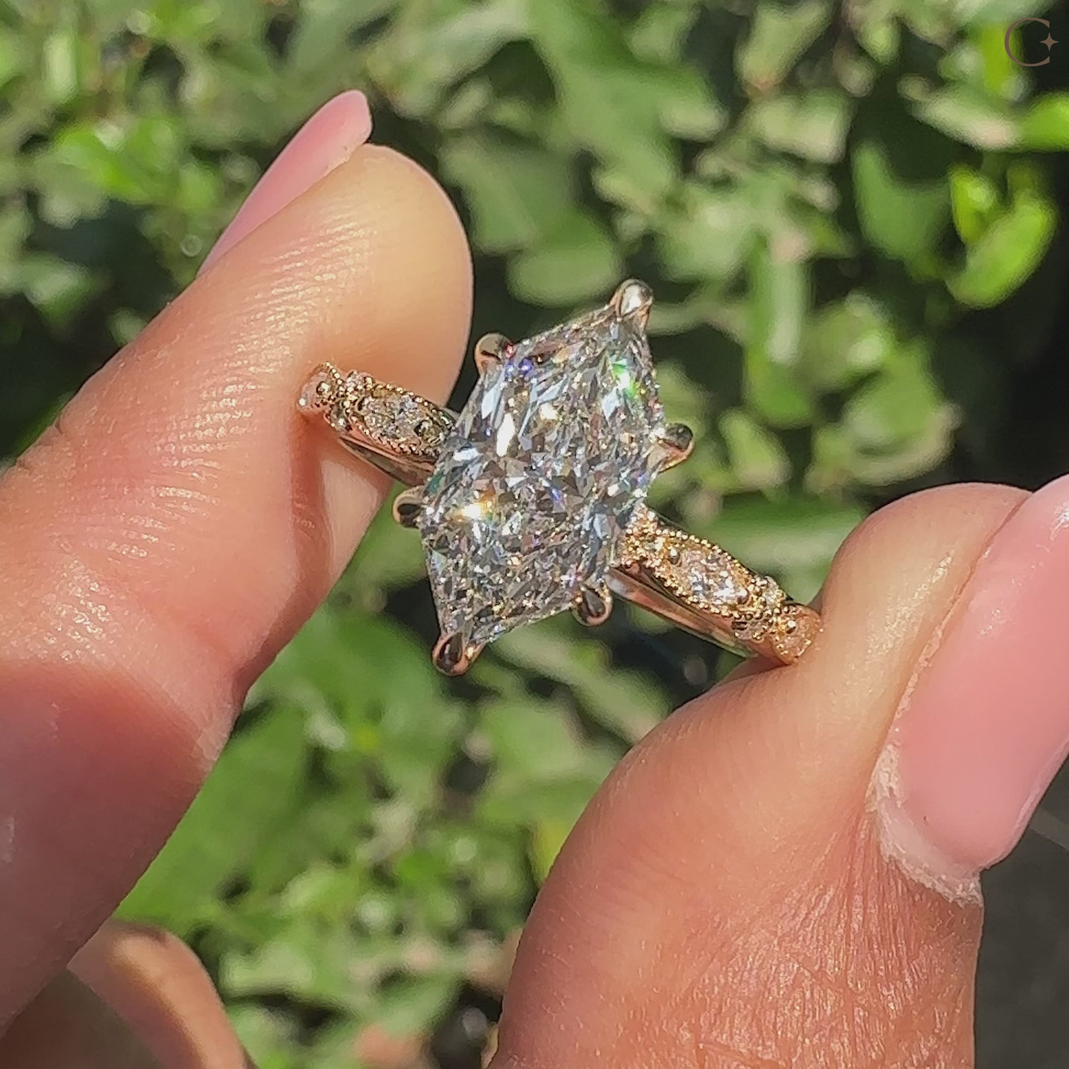 Dutch marquise engagement ring with detailed accents.
