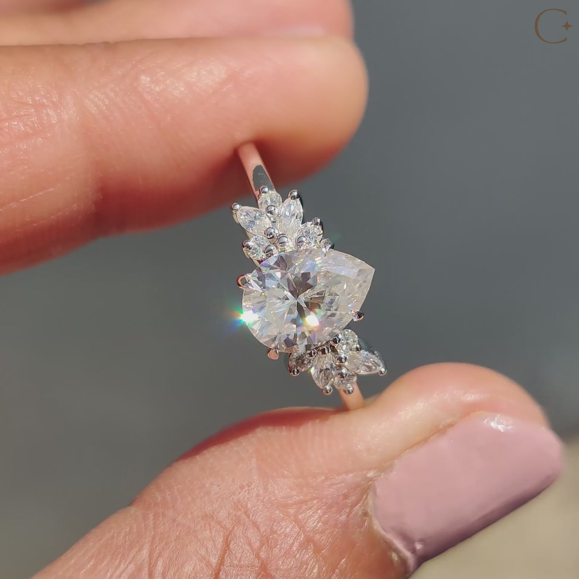 White gold engagement ring with pear cut Moissanite