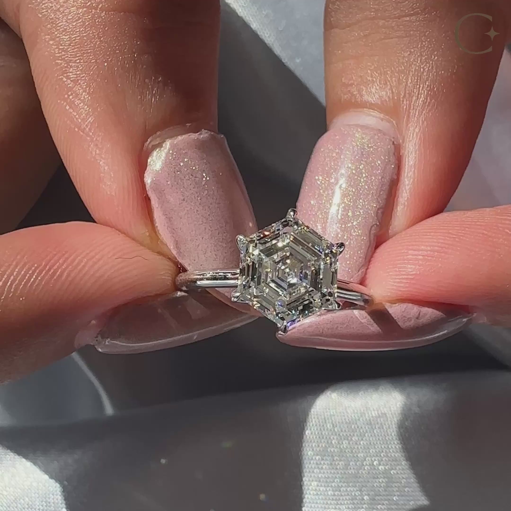 6 claw prong setting with cathedral setting ring.