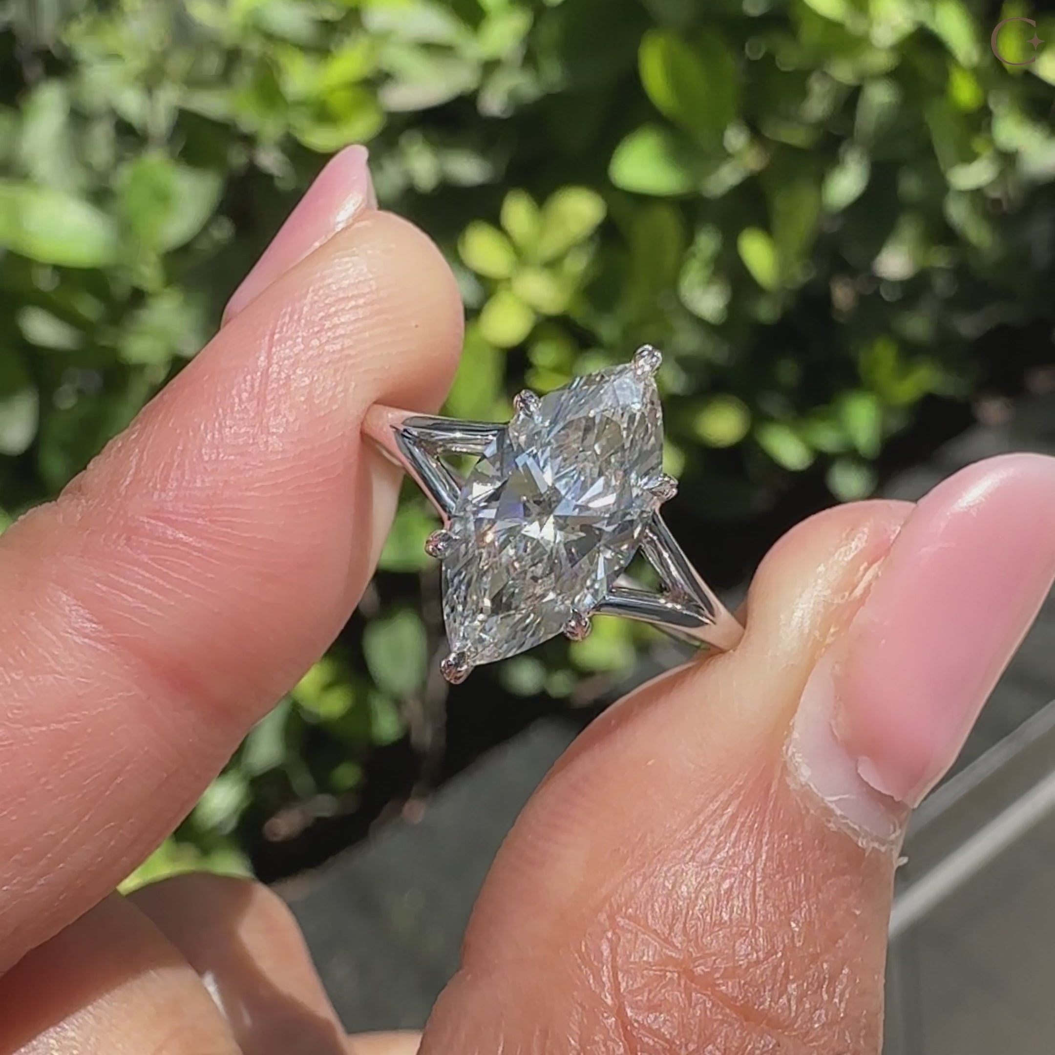 Split shank solitaire marquise diamond ring with lab grown diamond.