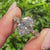Oval diamond Sakura flower engagement ring.
