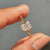 Split shank ring featuring a stunning diamond centerpiece.
