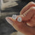 Carat Diamonds earrings collection offering handmade earrings with round cut stud earrings in white gold.