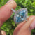 Marquise lab diamond ring with blue center and halo