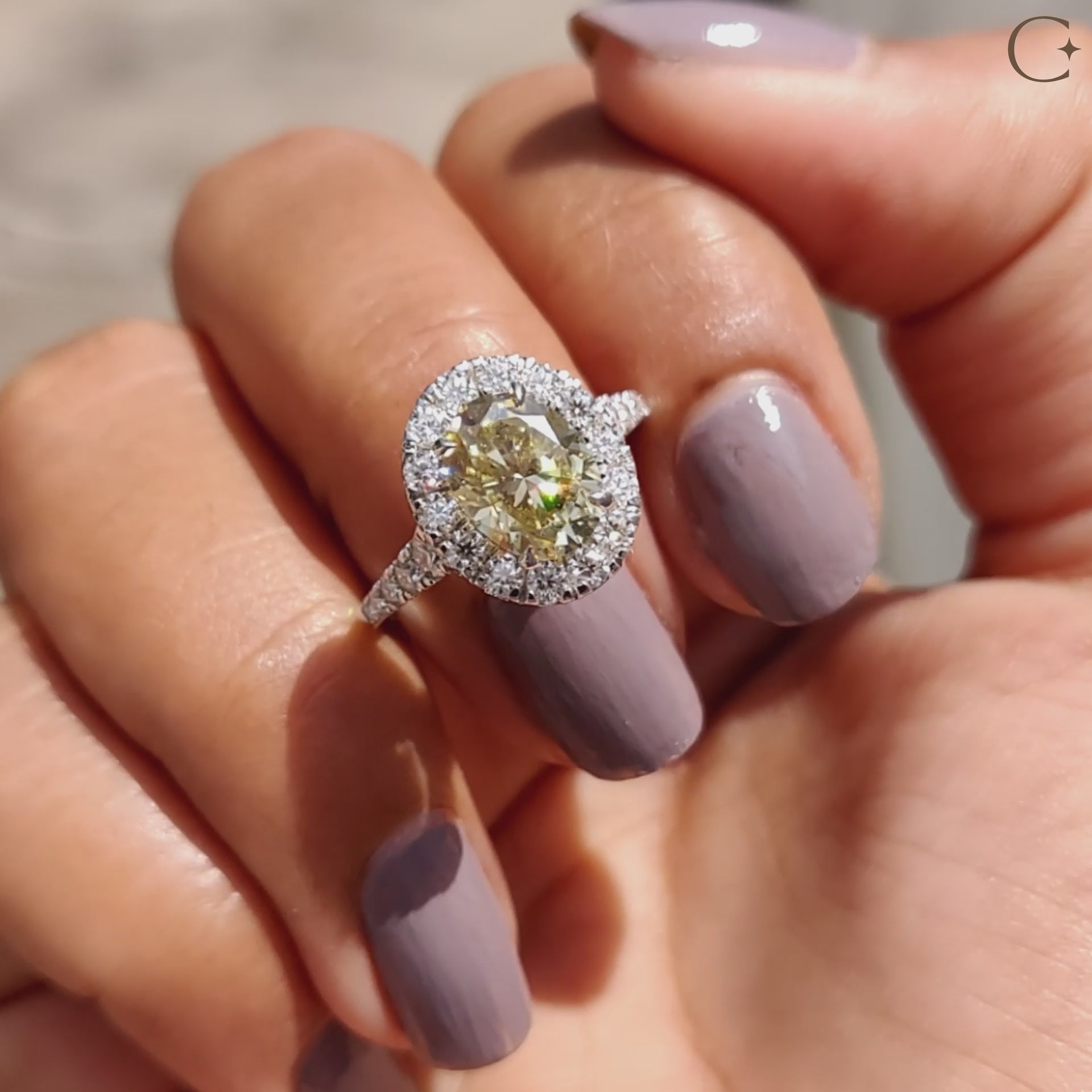 Engagement ring micro pave setting with a round cut moissanite stone.