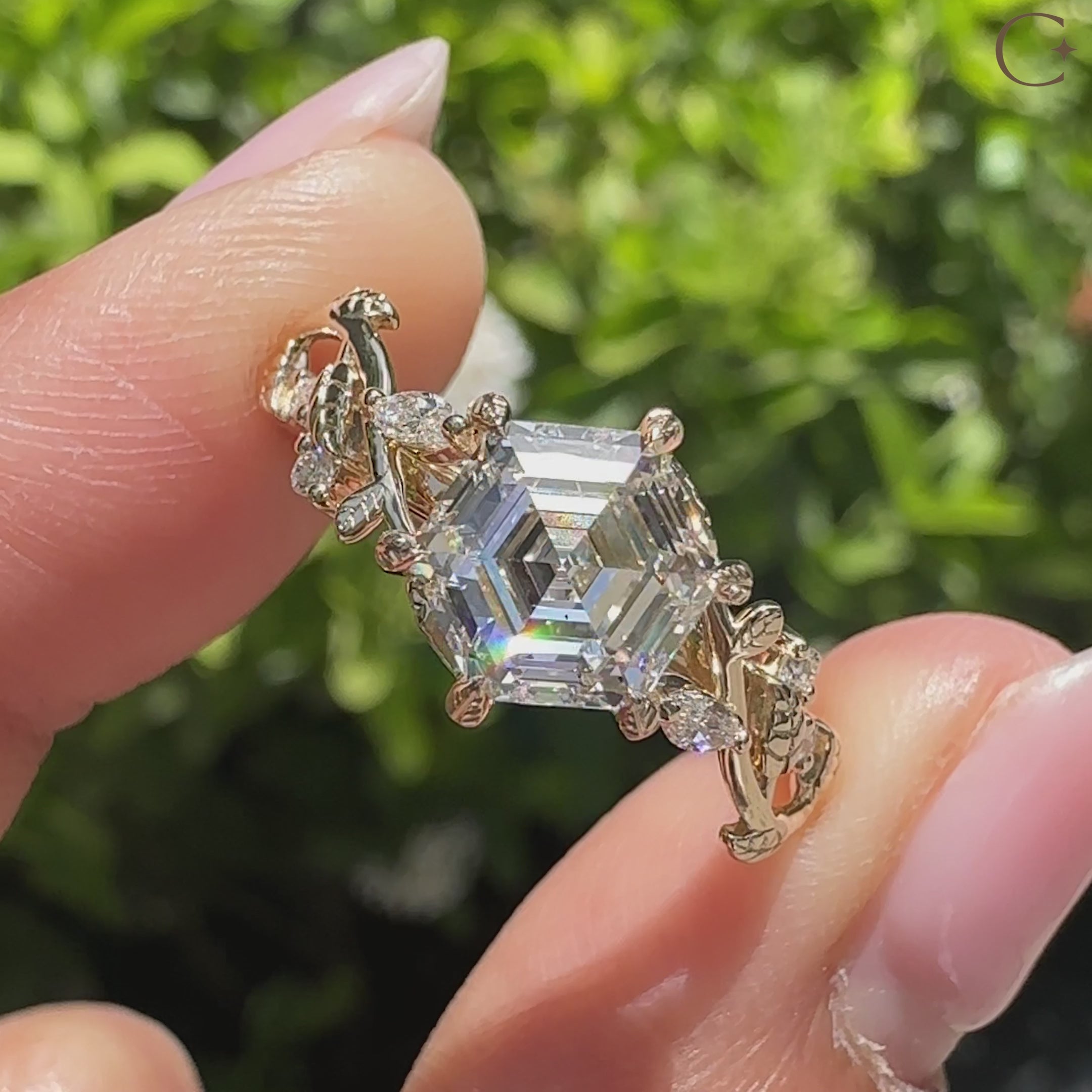 Nature inspired hexagon diamond ring with leaf detail accents
