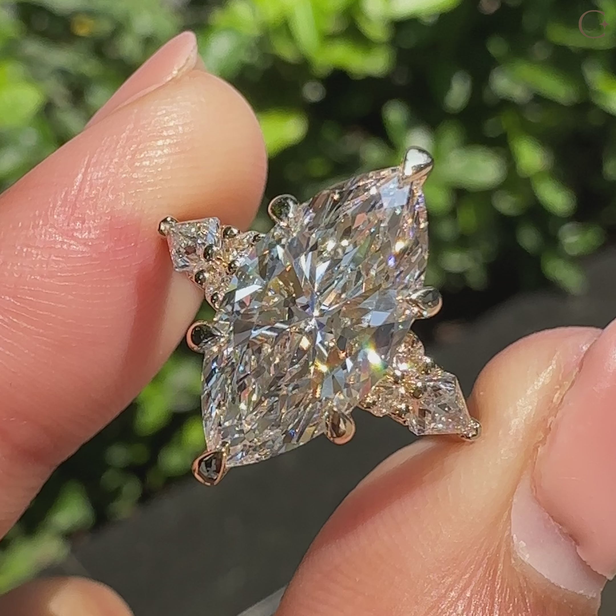 Marquise ring with muse setting and pinch shank.
