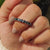 Black Moissanite Band offers a striking contrast to any set.