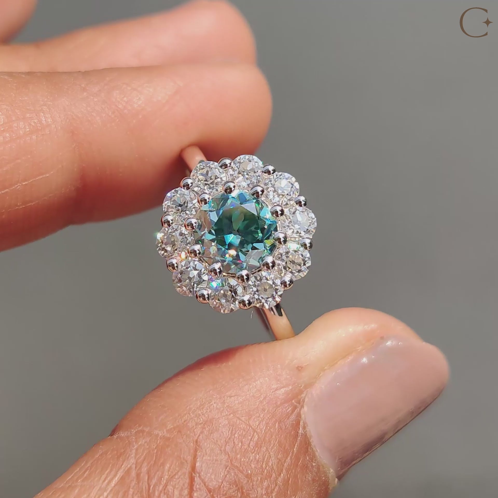 Round OEC cut moissanite glows with antique style brilliance.