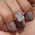 Moissanite ring in a custom setting, designed to impress.