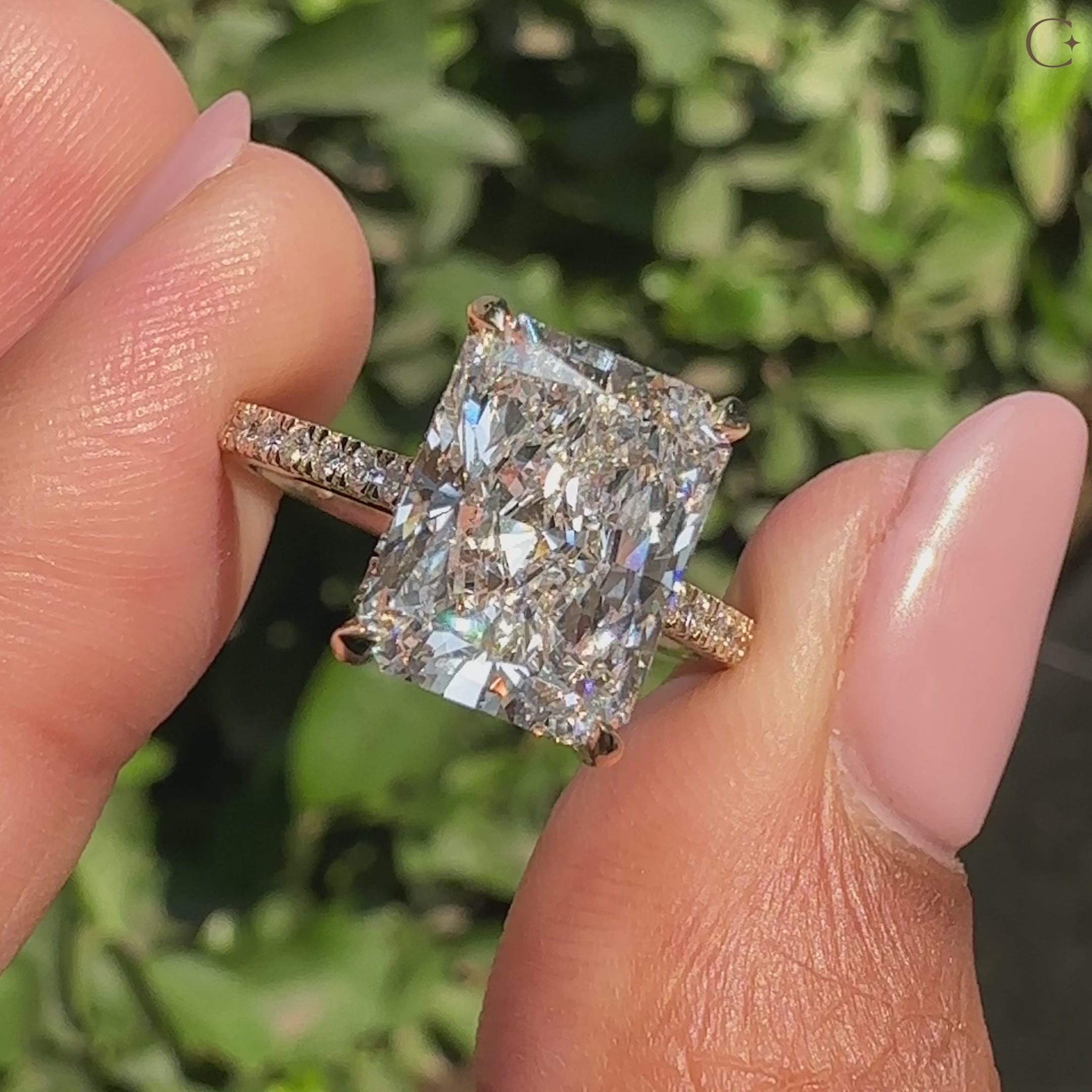 Radiant cut diamond ring with pave band
