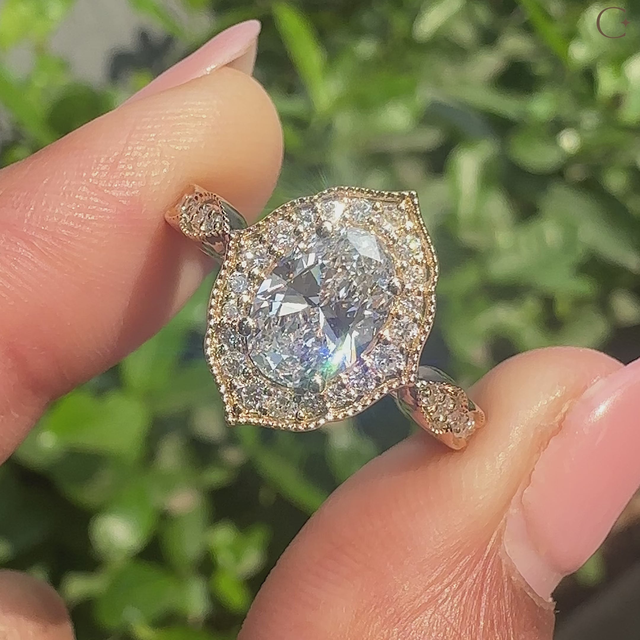 Vintage oval cut diamond ring with milgrain detail.
