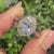 Vintage oval cut diamond ring with milgrain detail.
