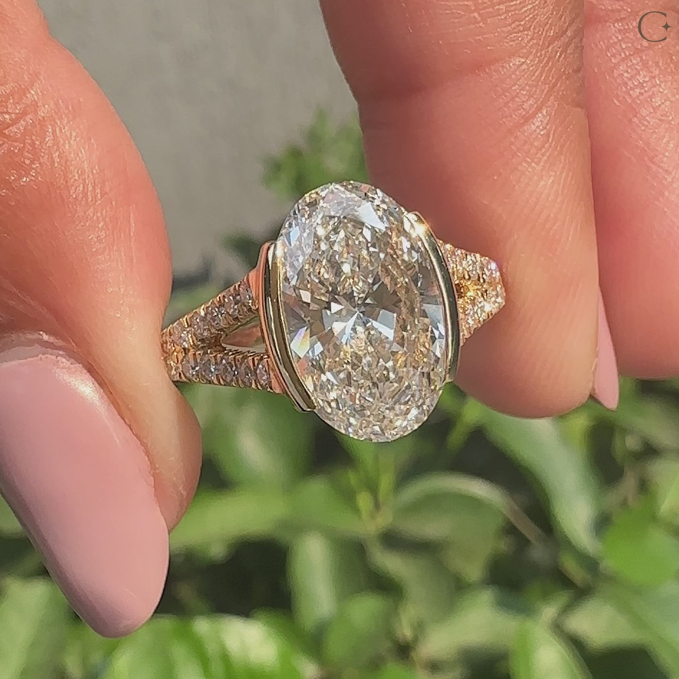 Oval shaped diamond ring with split shank pave band
