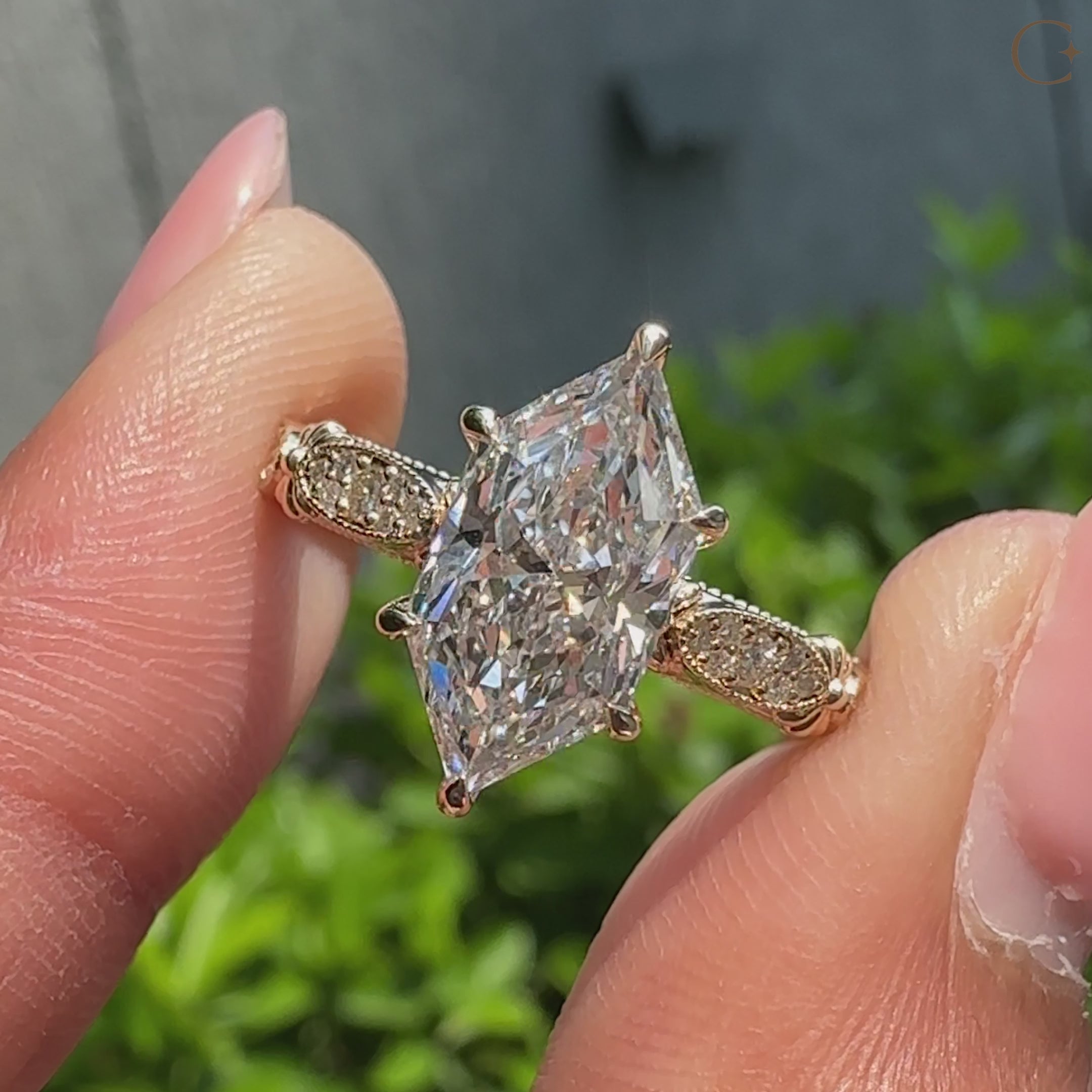 Dutch marquise center diamond with round accent diamonds.

