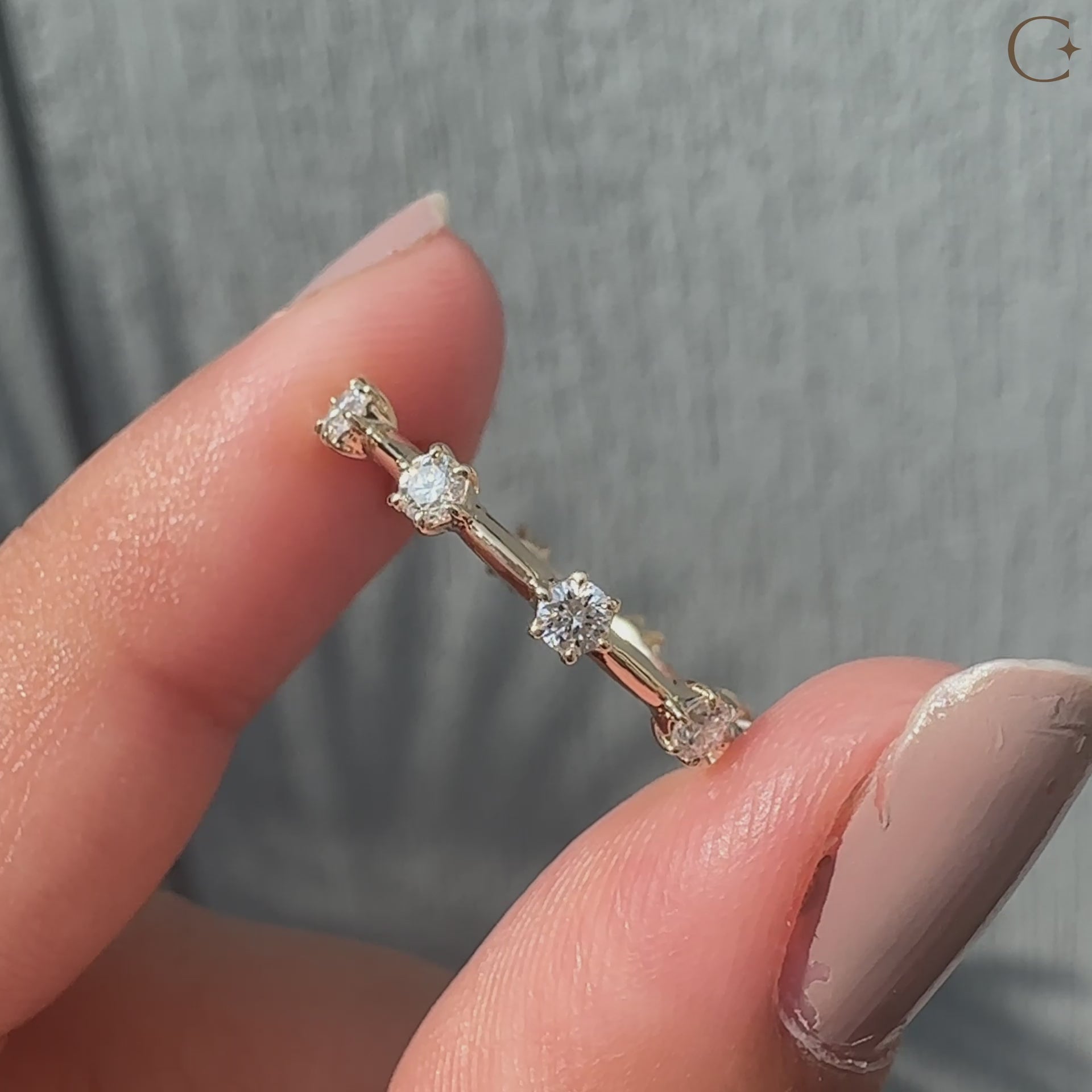 Yellow Gold Wedding Band with round cut diamonds.
