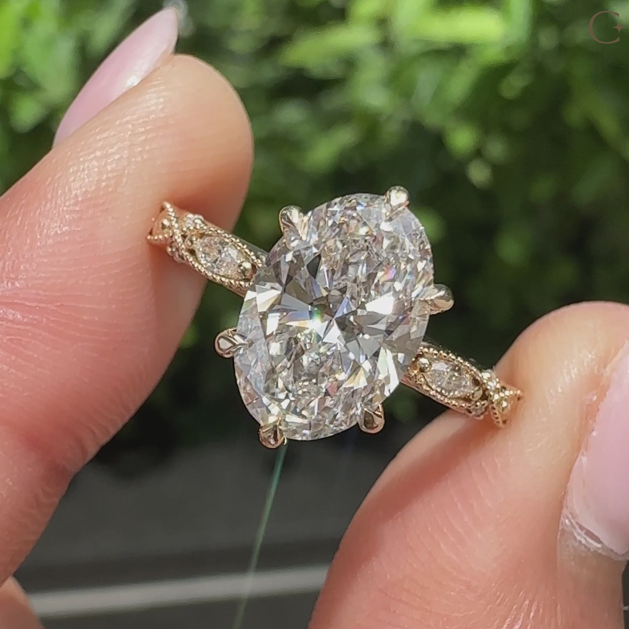 Vintage inspired oval diamond ring with milgrain details

