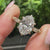 Vintage inspired oval diamond ring with milgrain details
